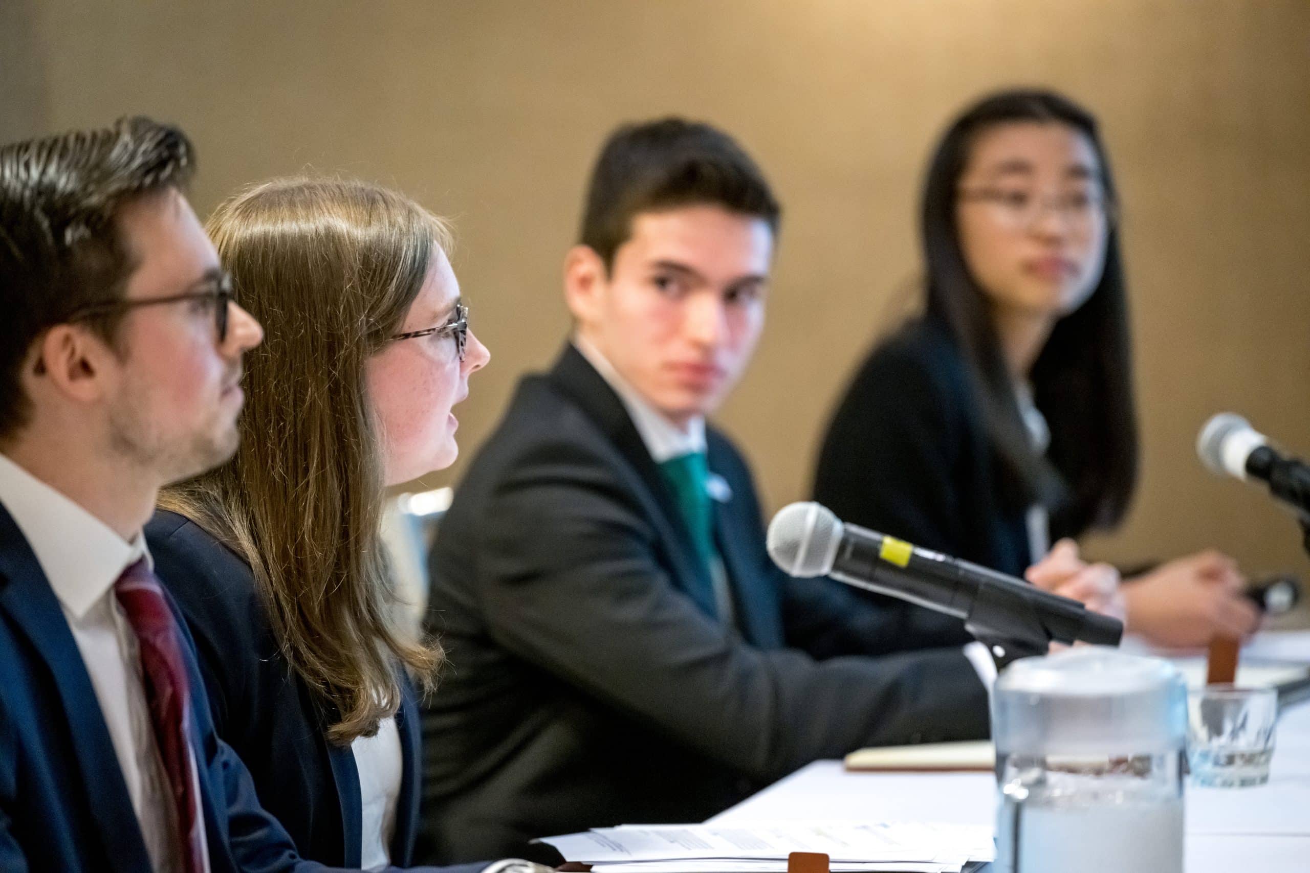 Four Notre Dame students present their fiscal policy plan.